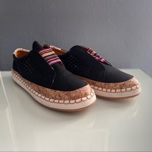 Black espadrille slip on sneakers